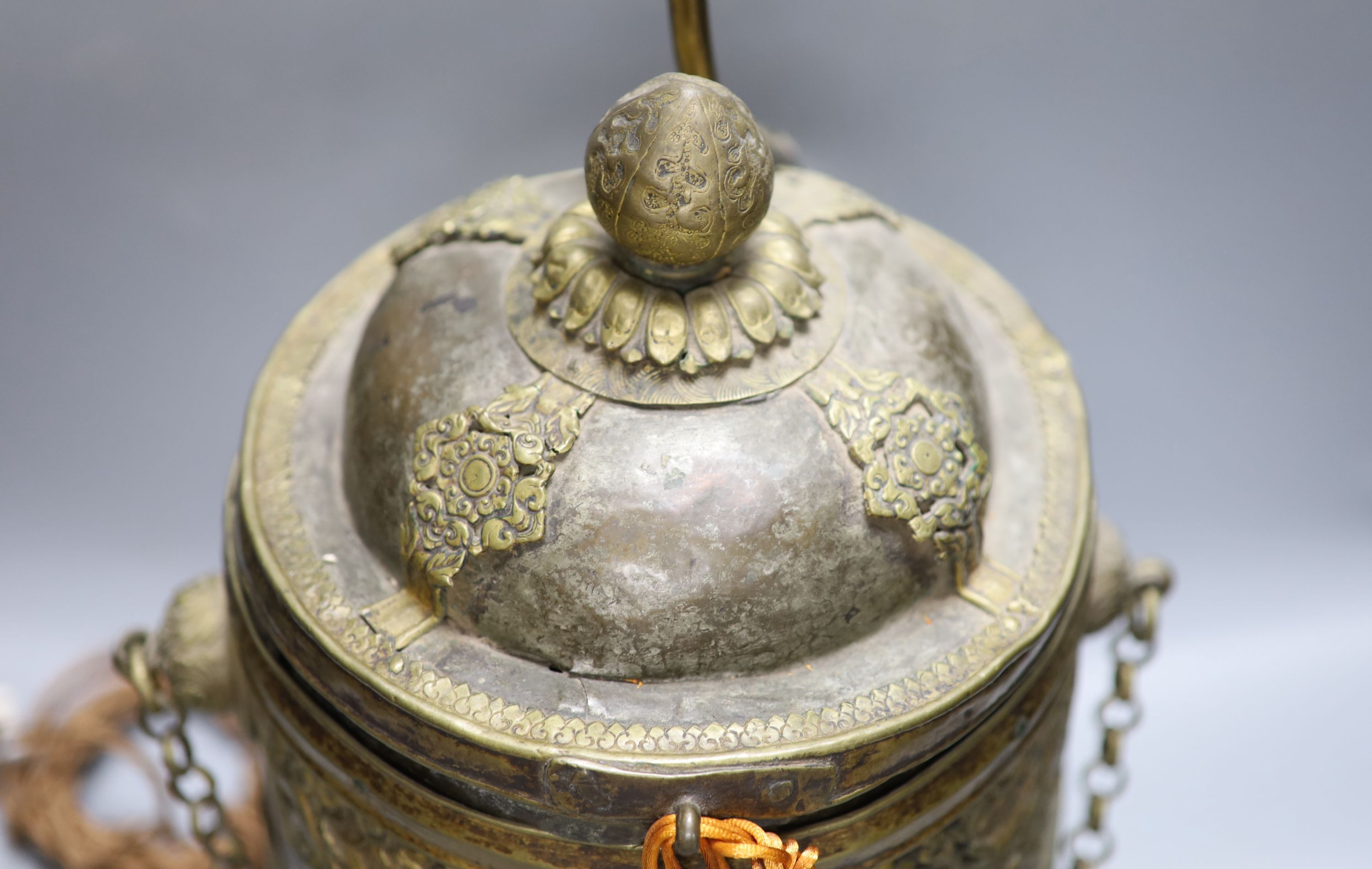 A Tibetan brass box converted lamp base, height 44cm excluding light fittings